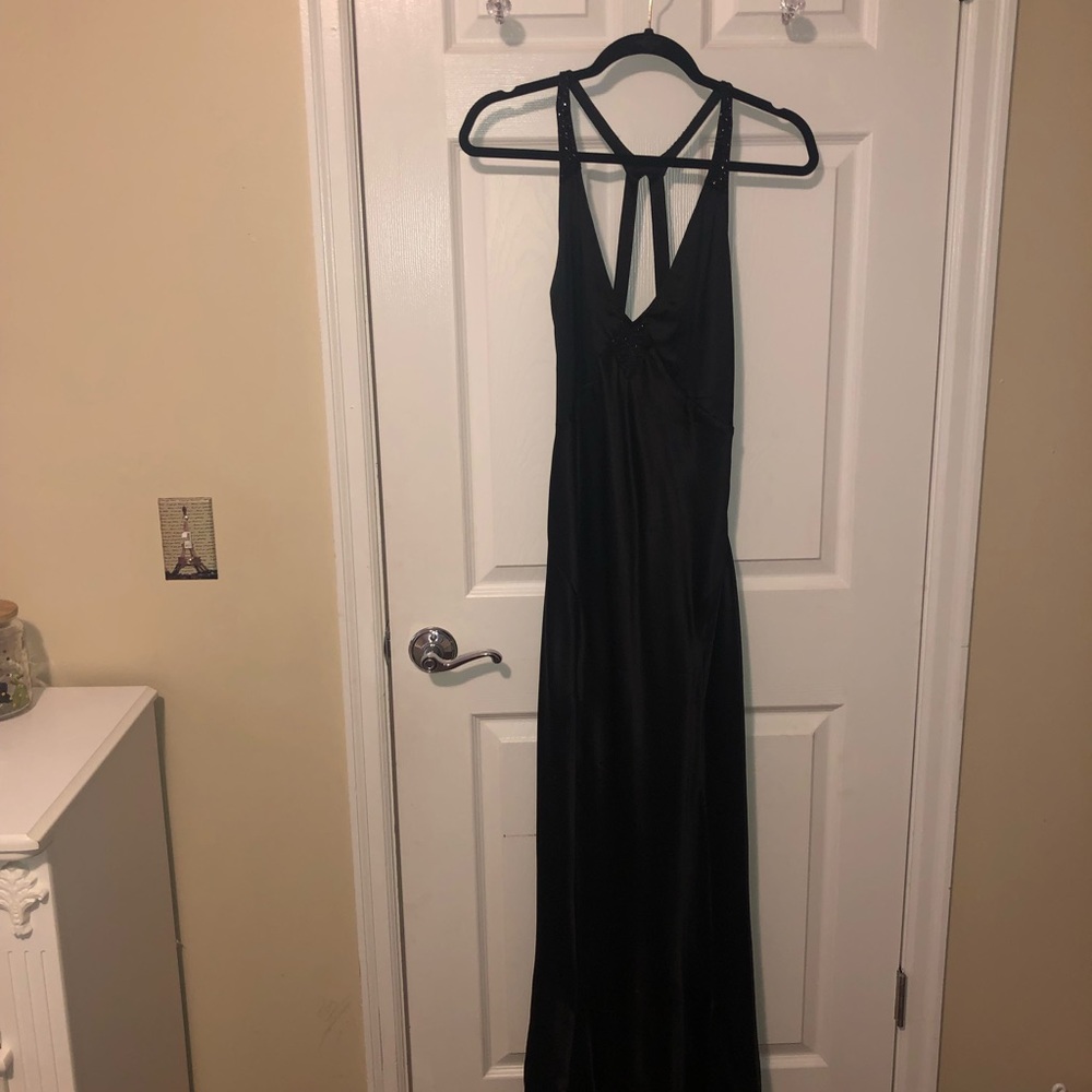 Express long satin black prom dress.